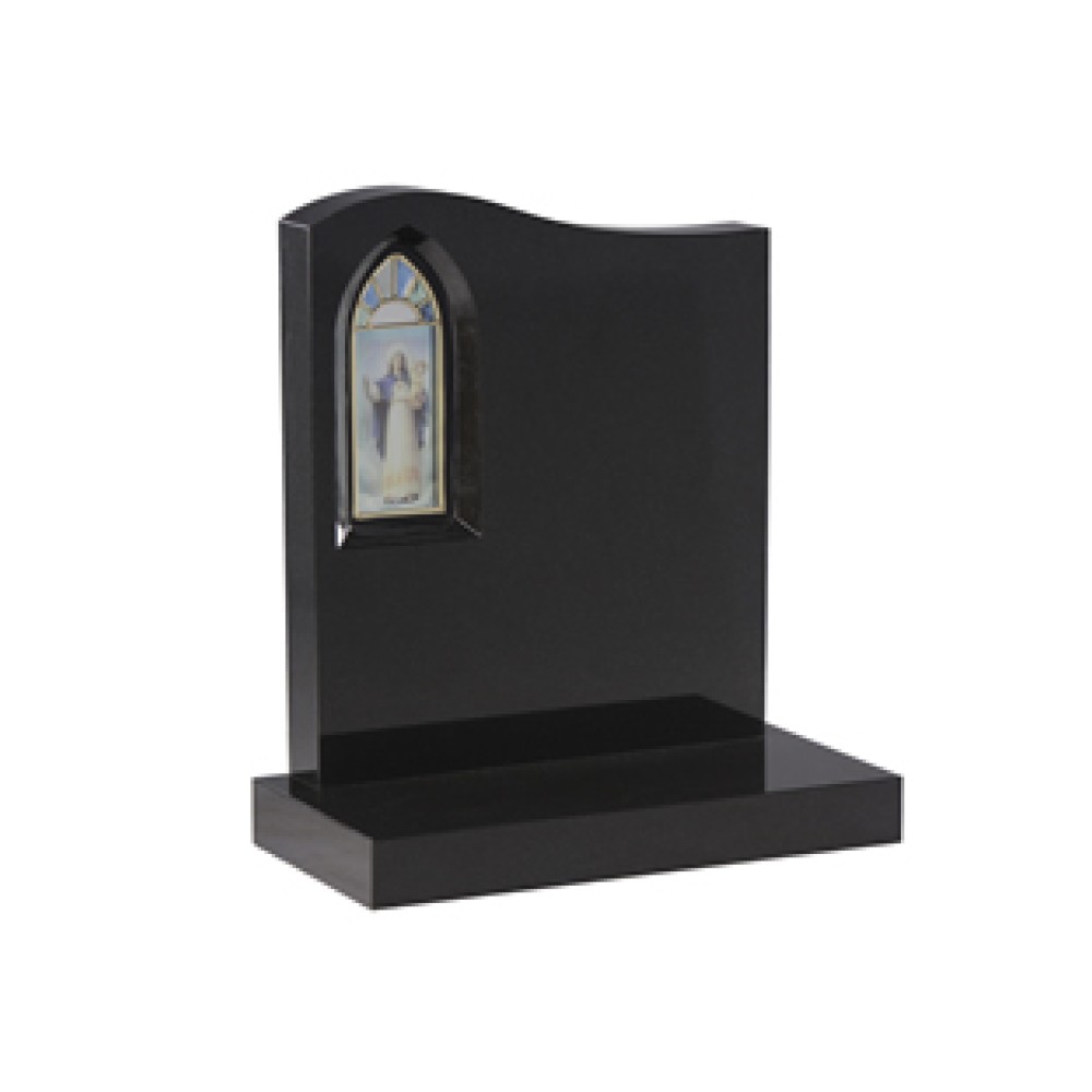 EC47 Black Granite half ogee headstone with a stained glass window in the top left shoulder. EC47 Black Granite half ogee headstone with a stained glass window in the top left shoulder.